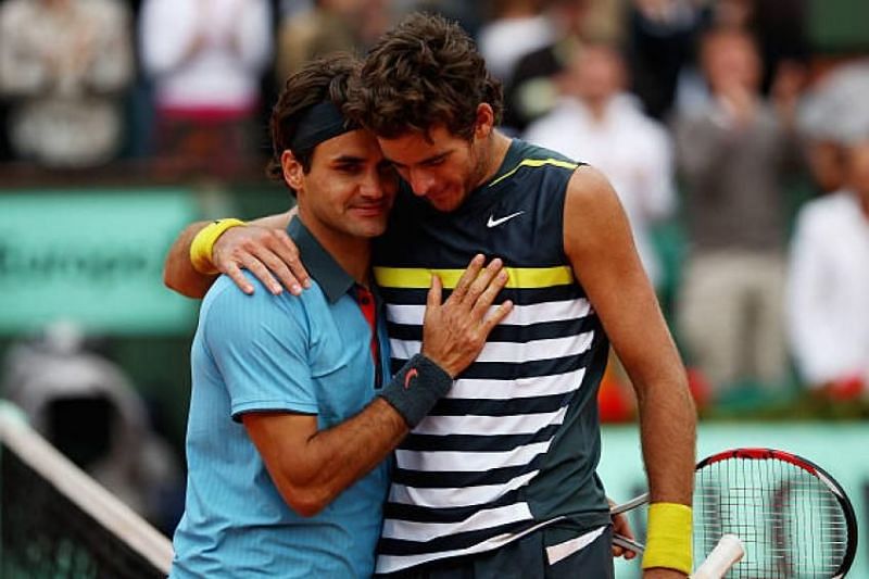 Juan Martin Del Potro and Roger Federer after their 2009 Roland Garros five-set semifinal