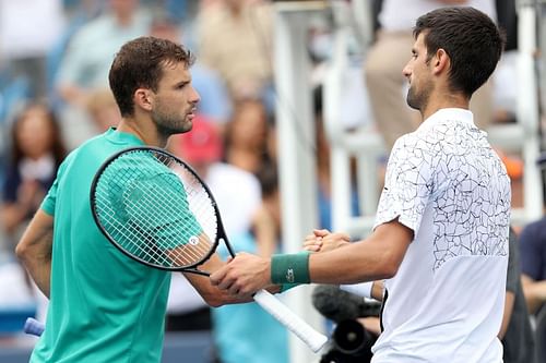 Grigor Dimitrov (L) and Novak Djoko