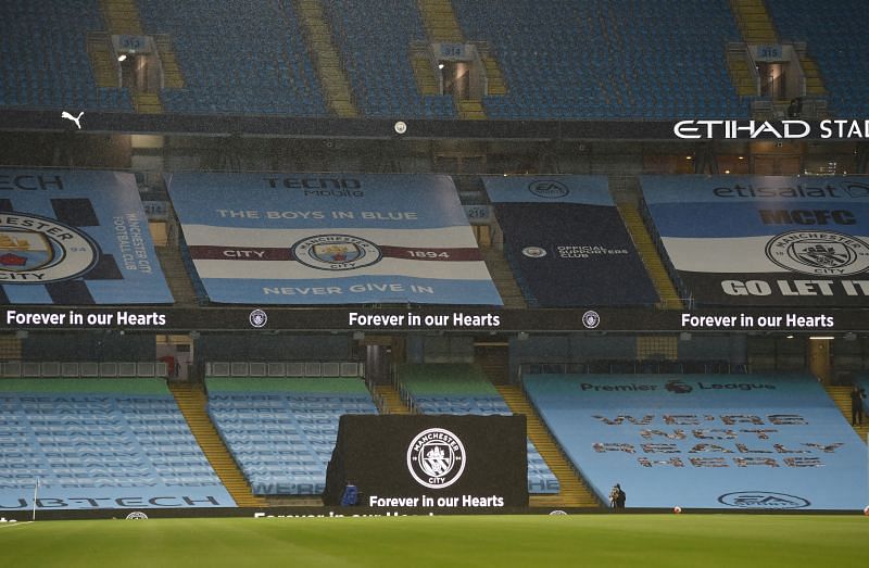 &quot;We&#039;re not really here&quot;, read the installations around the stadium as the Premier League returned.