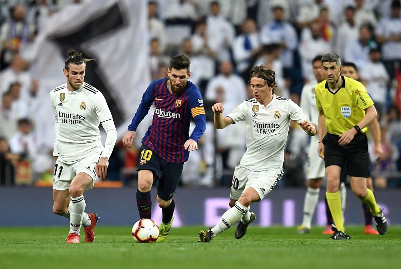 Luka Modric and Lionel Messi are fierce rivals on the pitch