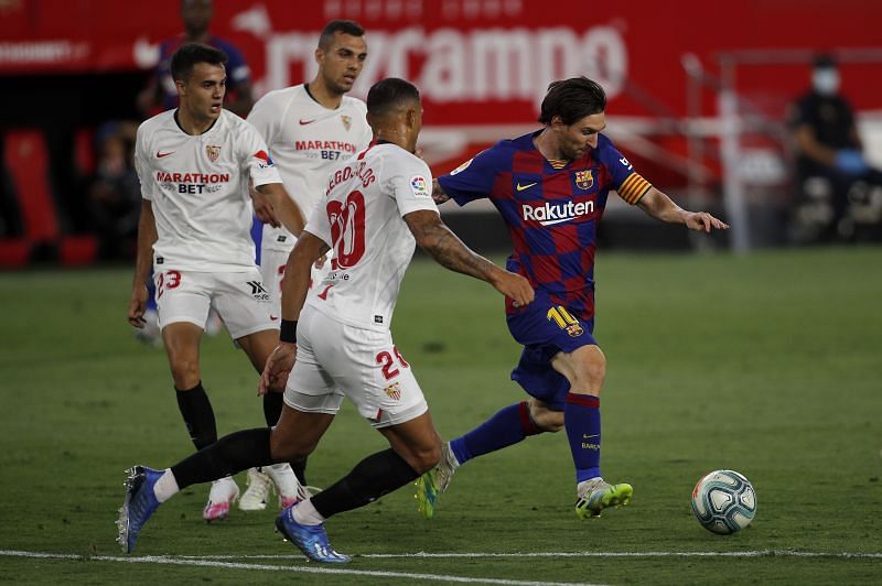 Sevilla produced a gritty performance to hold Barcelona at home