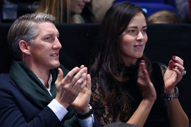 Ana Ivanovic (R) attending one of Novak Djokovic's matches at the ATP Finals in London