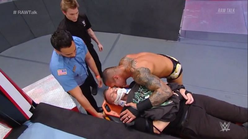 Orton whispers something in Christian&#039;s air
