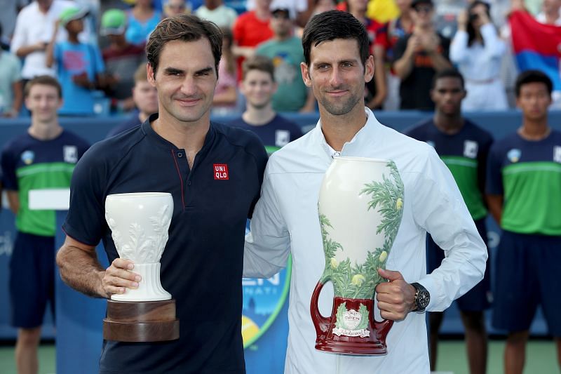Roger Federer (L) and Novak Djokovic