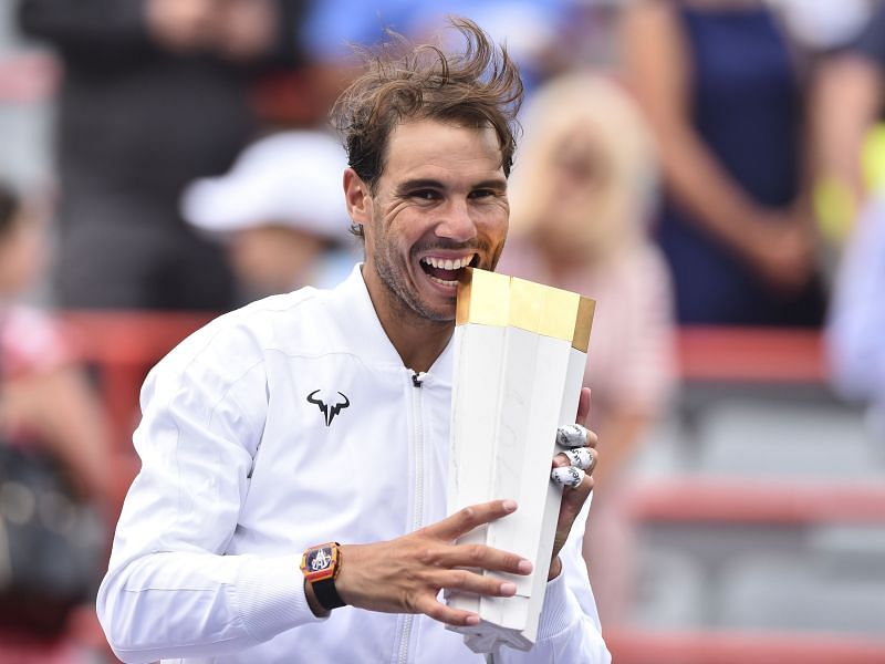 Nadal takes a bite of the Rogers Cup 2019 trophy - his fifth at the event