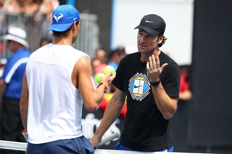 Moya explaining to Rafael Nadal during a practice session