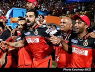 RCB celebrate after beating Gujarat Lions to reach the final in IPL 2016