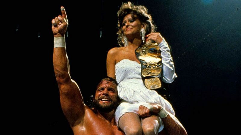 Macho Man Randy Savage hoists Miss Elizabeth on his shoulder to celebrate his WWE Championship win at WrestleMania IV