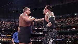 Undertaker competes against The Big Show and A-Train at WrestleMania 19