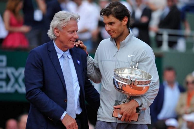 Bjorn Borg presents the French Open trophy to Rafael Nadal in 2014