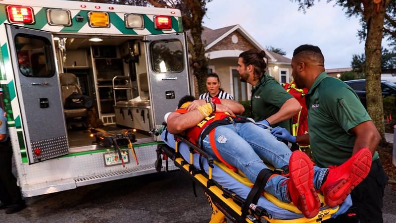 Elias being taken into the ambulance after being run over by a car on SmackDown