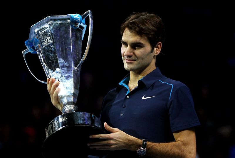 Roger Federer with the 2011 ATP Finals trophy