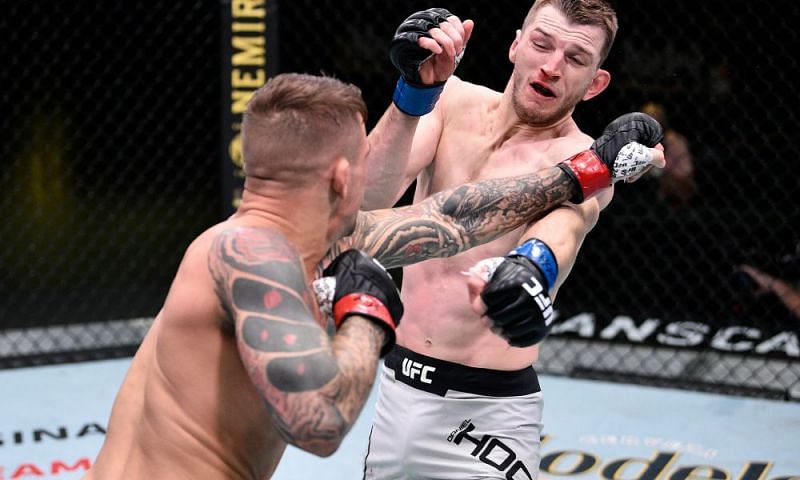 Dustin Poirier and Dan Hooker went to war in an instant UFC classic last night