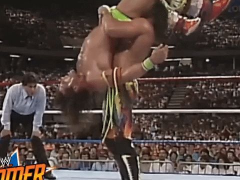 Rick Rude hitting the Ultimate Warrior with the Ganso Bomb