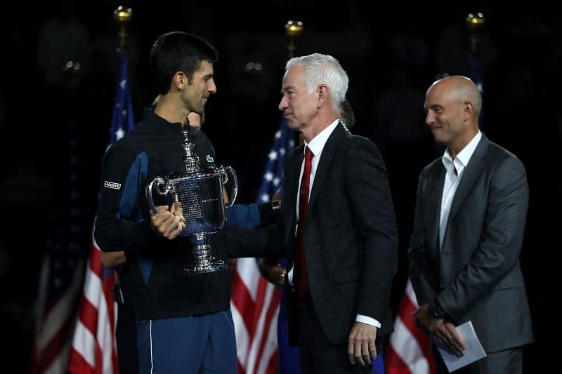 Novak Djokovic (L) and John McEnroe