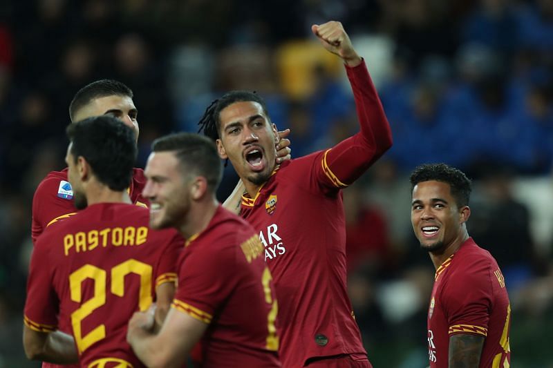 Chris Smalling celebrates a goal for AS Roma.