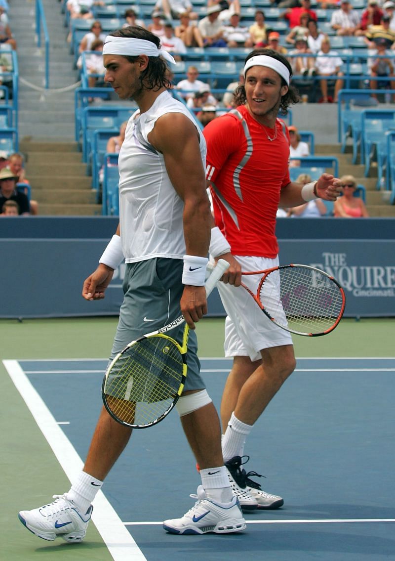 Rafael Nadal (L) and Juan Monaco
