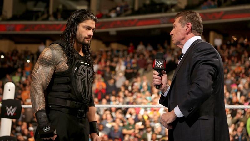 Vince McMahon and Roman Reigns in WWE