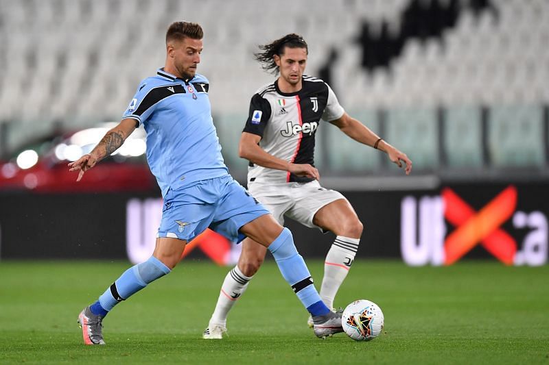 Milinkovic-Savic battling with Juventus&#039; Adrien Rabiot during an action-packed clash in Turin