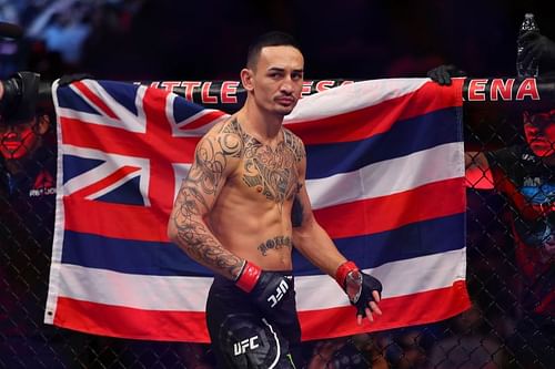 Max Holloway feels no added pressure to win his title back