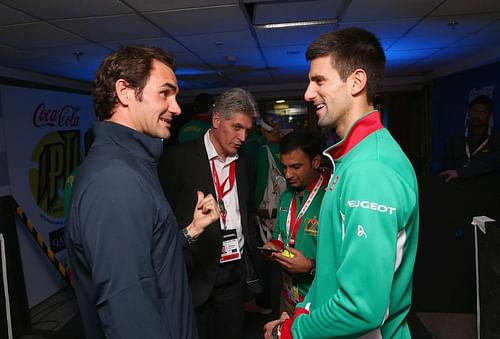 Roger Federer (L) and Novak Djokovic