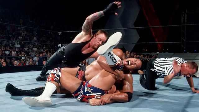 The Undertaker interrupting The Rock&#039;s pinfall