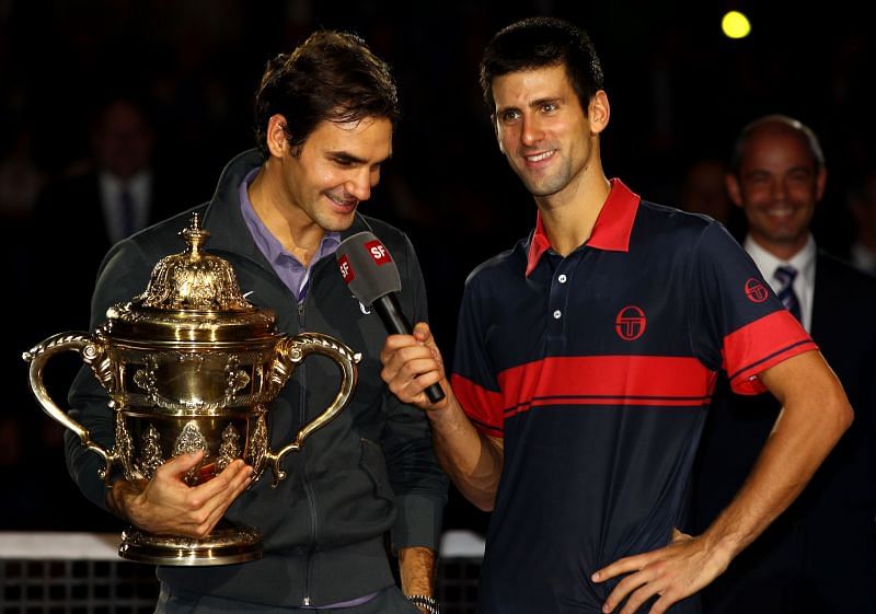 Roger Federer (L) and Novak Djokovic at the SSwiss Indoors 2010