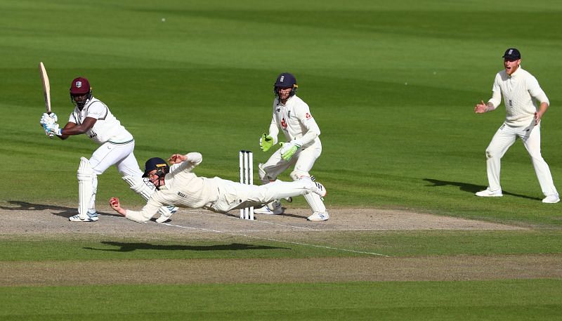 Ollie Pope plunges across to hammer the final nail in Windies&#039; coffin.