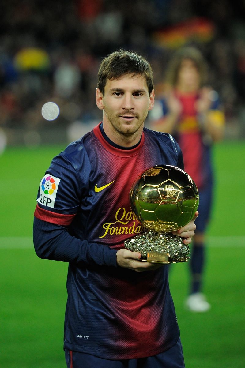 Lionel Messi presents his Ballon d&#039;Or to the Nou Camp faithful.