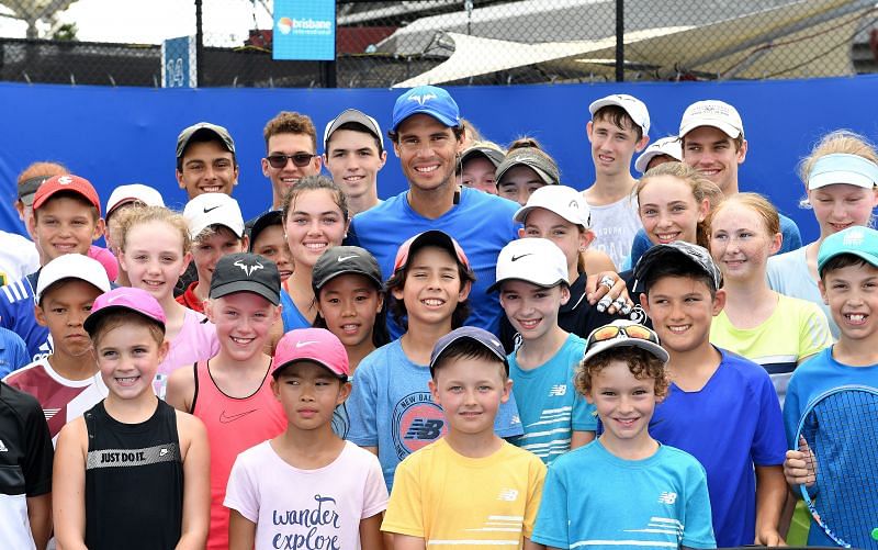 Rafael Nadal with members of his academy during the 2019 Brisbane International