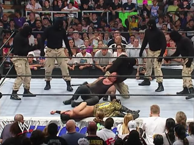 Masked men attacking The Undertaker in WWE
