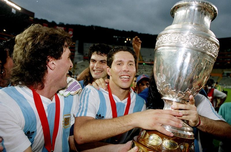 Diego Simeone with the 1990 Copa America trophy. Argentina has failed to win anything of note since.