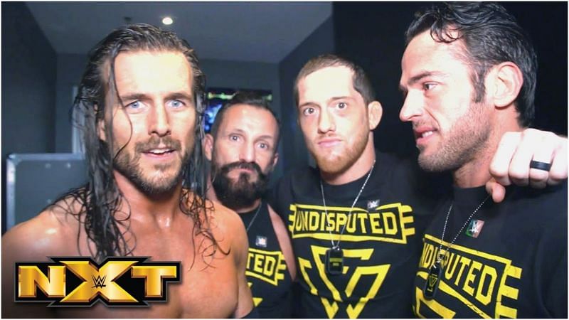 Adam Cole with The Undisputed Era