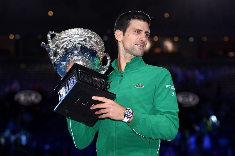 Novak Djokovic poses with the 2020 Australian Open title