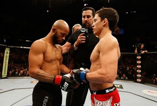 Demetrious Johnson and Joseph Benavidez touching gloves