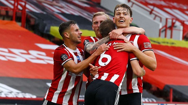 Sheffield United players celebrate their win against EPL giants Spurs