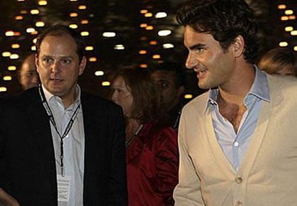 Roger Federer had founded &#039;Team8&#039; with his longtime agent Tony Godsick (left)