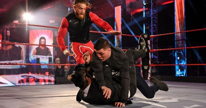 Dominik attacks Seth Rollins on RAW as Murphy tries to intervene.