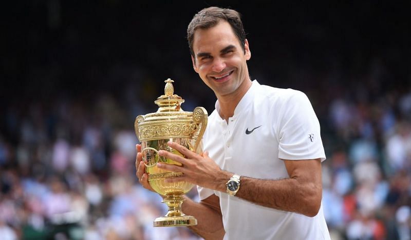 Roger Federer is all smiles after winning the 2017 Wimbledon men&#039;s singles title.