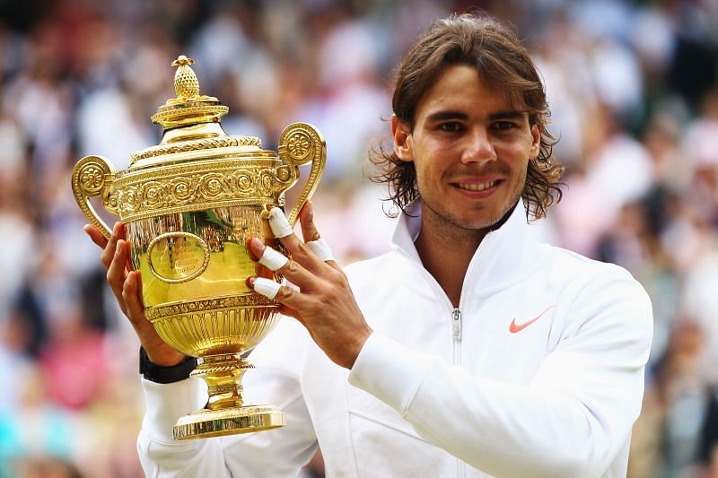 Rafael Nadal with his 2010 Wimbledon title