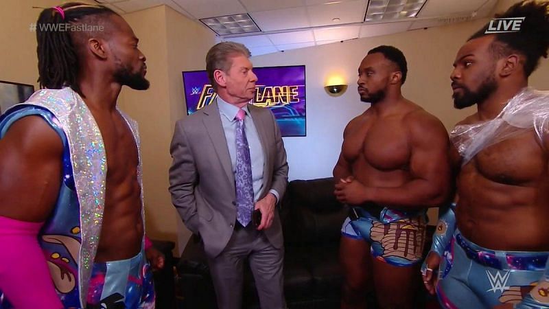 Vince McMahon interacting with The New Day