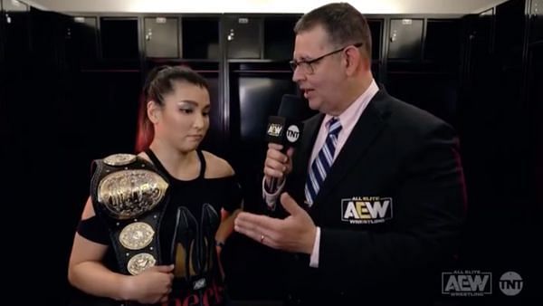 Hikaru Shida (left) being interviewed by Alex Marvez