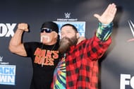 Mick Foley (right) with Hulk Hogan