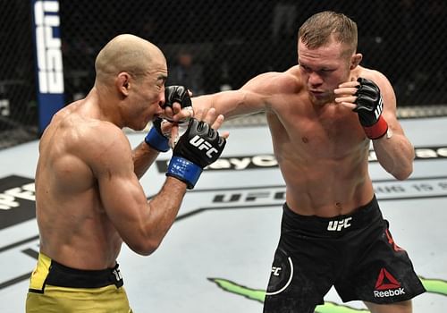 Petr Yan in action against Jose Aldo at UFC 251