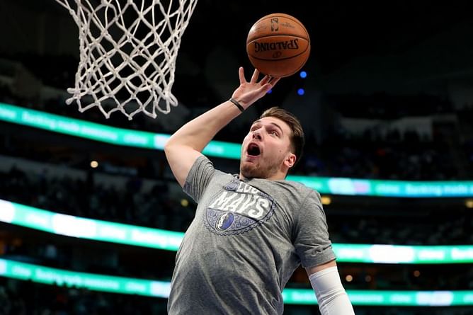 NBA Orlando Update: Luka Doncic drains trick shot in practice, Troy Daniels becomes bubble guide