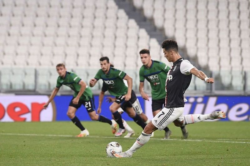 Cristiano Ronaldo taking a successful penalty for Juventus in the 2019-20 Serie A.