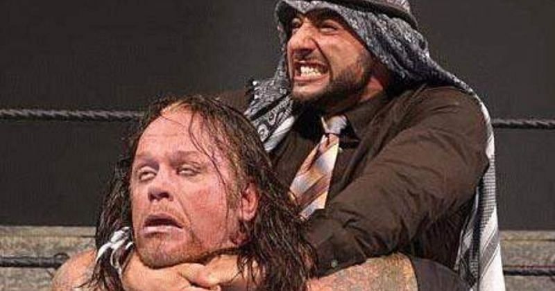 Muhammad Hassan and The Undertaker.