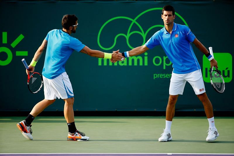 Janko Tipsarevic (L) and Novak Djokovic