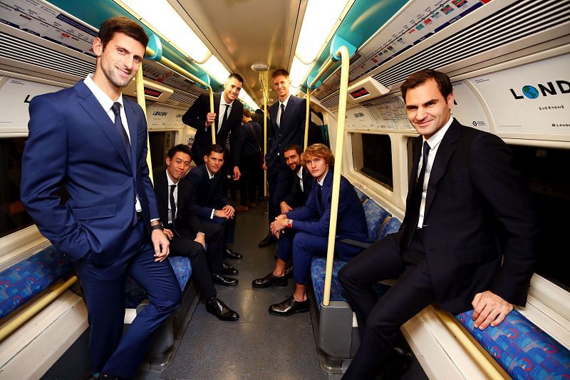 Novak Djokovic and Roger Federer with other tennis stars