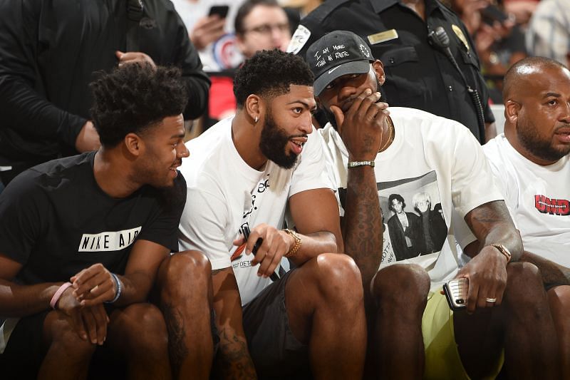 LeBron James, Anthony Davis and Quin Cook at a WNBA game